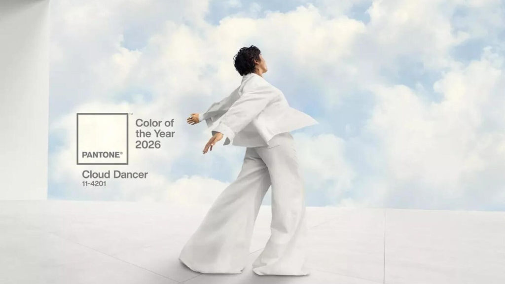 person dressed in flowing white clothing representing cloud dancer pantone 2026 color of the year.